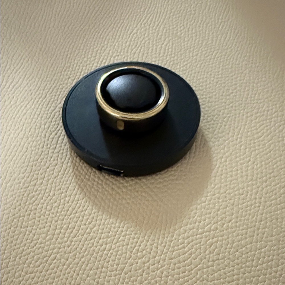 Oura Gold and Black Smart Ring